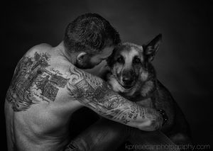 Retired Marine Corps Capt. Jason Haag with his service dog, Axel. Jason shared his "Alive Day" with Axel's birthday.